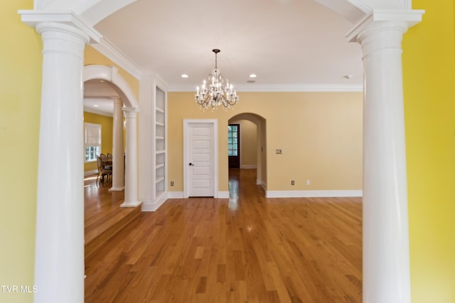 133 Knob Creek Dock Rd, Johnson City, TN 37601 - unfurnished room featuring recessed lighting, arched walkways, light wood finished floors, crown molding, and baseboards