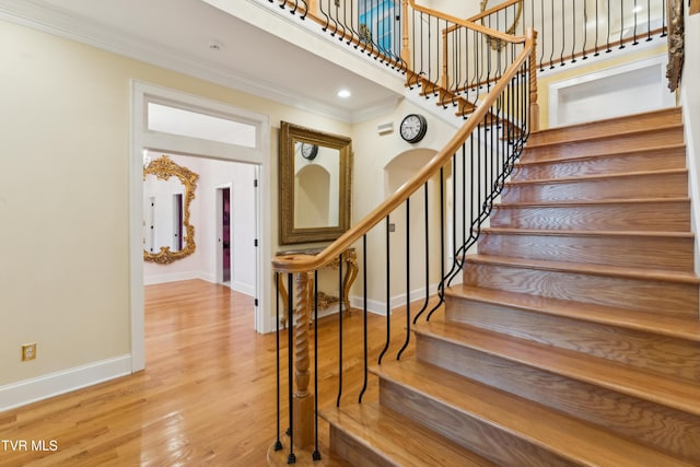 133 Knob Creek Dock Rd, Johnson City, TN 37601 - staircase featuring baseboards, crown molding, and wood finished floors