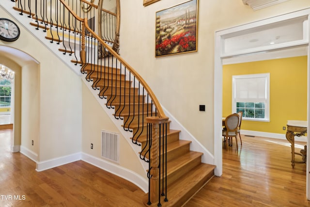 133 Knob Creek Dock Rd, Johnson City, TN 37601 - stairway with wood finished floors, healthy amount of natural light, and baseboards