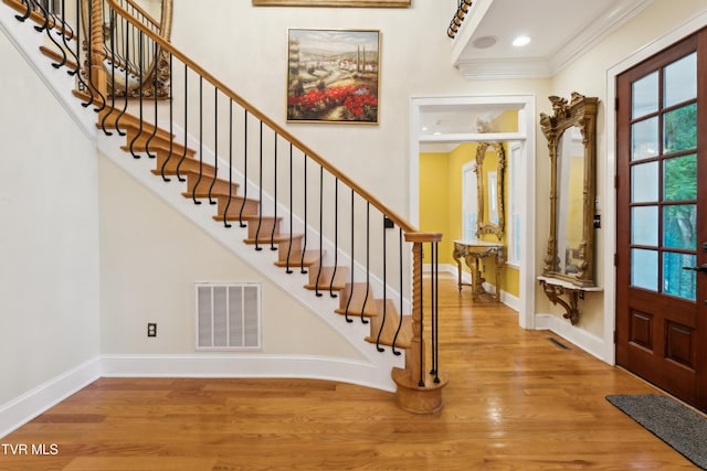 133 Knob Creek Dock Rd, Johnson City, TN 37601 - foyer entrance with plenty of natural light, crown molding, wood finished floors, stairs, and recessed lighting