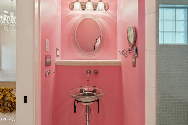 133 Knob Creek Dock Rd, Johnson City, TN 37601 - bathroom with a chandelier