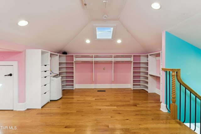 133 Knob Creek Dock Rd, Johnson City, TN 37601 - spacious closet featuring washer / dryer, vaulted ceiling, and light wood-type flooring