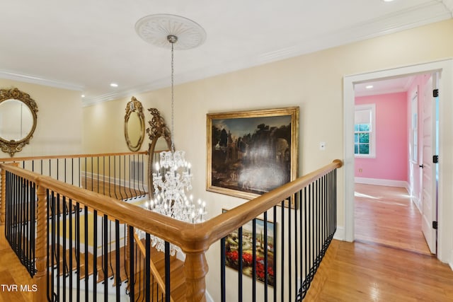 133 Knob Creek Dock Rd, Johnson City, TN 37601 - hall featuring an upstairs landing, crown molding, a chandelier, wood finished floors, and recessed lighting