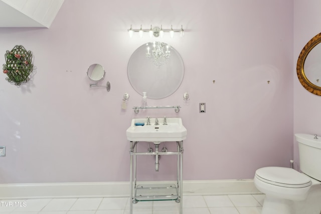 133 Knob Creek Dock Rd, Johnson City, TN 37601 - bathroom with toilet, a sink, baseboards, and tile patterned flooring