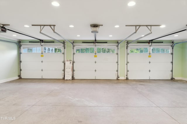 133 Knob Creek Dock Rd, Johnson City, TN 37601 - garage with recessed lighting, a garage door opener, and baseboards