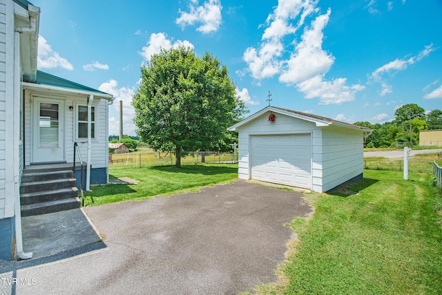 1002 Massachusetts Ave, Bristol, VA 24201 - detached garage featuring asphalt driveway