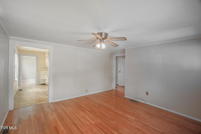 1002 Massachusetts Ave, Bristol, VA 24201 - spare room featuring a ceiling fan, light wood-style flooring, and crown molding