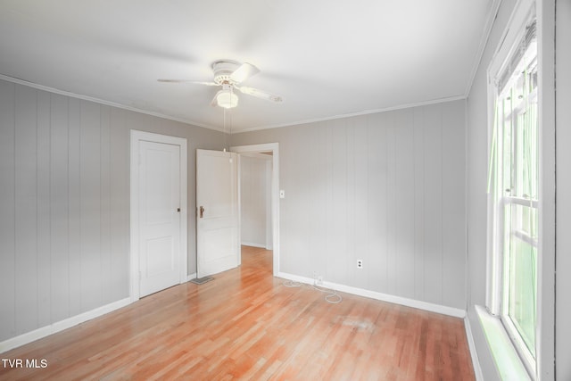 1002 Massachusetts Ave, Bristol, VA 24201 - unfurnished bedroom with light wood finished floors, crown molding, and ceiling fan