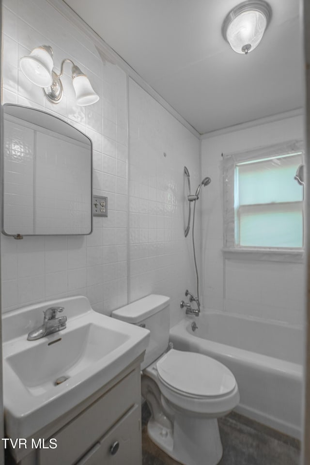 1002 Massachusetts Ave, Bristol, VA 24201 - bathroom with tile walls, vanity, and  shower combination