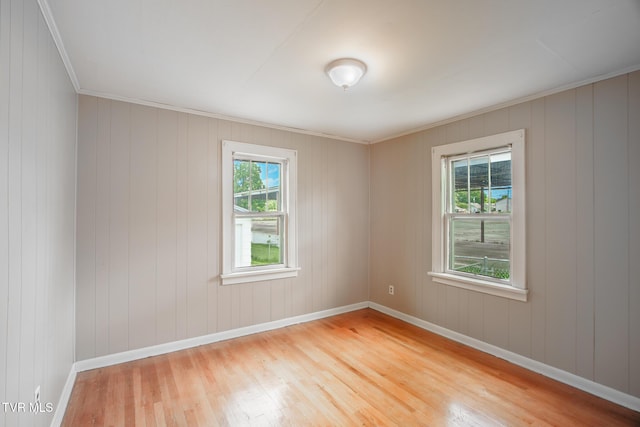 1002 Massachusetts Ave, Bristol, VA 24201 - empty room with light wood finished floors and crown molding