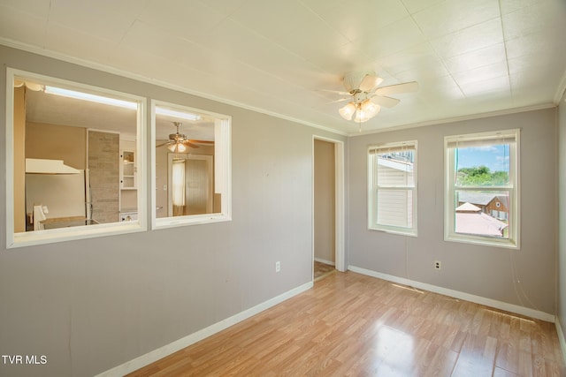 1002 Massachusetts Ave, Bristol, VA 24201 - spare room with ceiling fan, wood finished floors, and ornamental molding