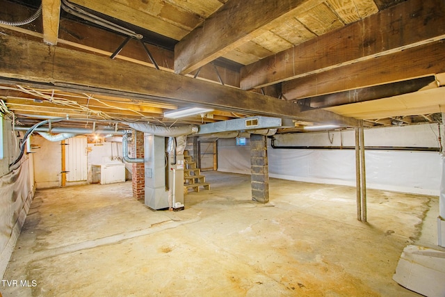 1002 Massachusetts Ave, Bristol, VA 24201 - unfinished below grade area featuring stairway and heating unit