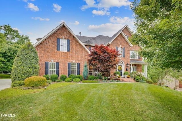 117 Quail Heights Ct, Kingsport, TN 37663 - view of front of home featuring brick siding and a front yard