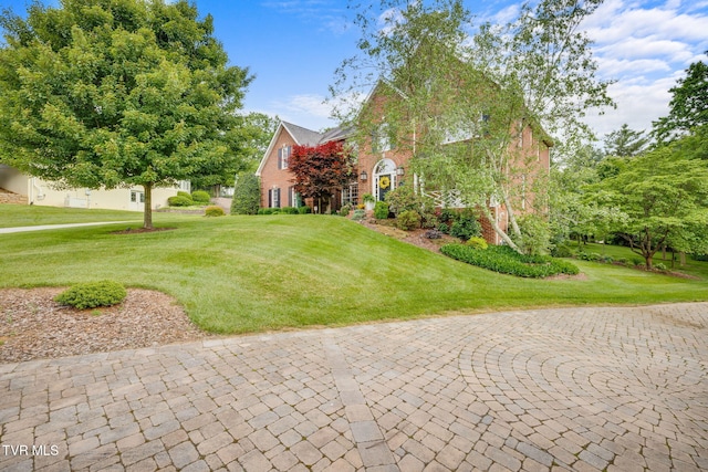 117 Quail Heights Ct, Kingsport, TN 37663 - view of front facade with a front yard and brick siding
