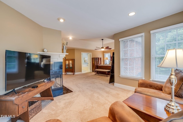117 Quail Heights Ct, Kingsport, TN 37663 - living area featuring light colored carpet, baseboards, recessed lighting, ceiling fan, and a tile fireplace