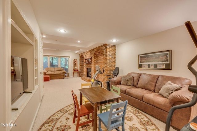 117 Quail Heights Ct, Kingsport, TN 37663 - living room featuring light colored carpet, recessed lighting, and a brick fireplace