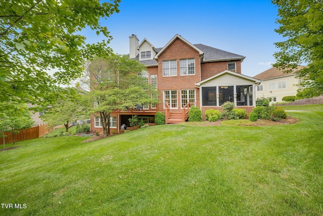 117 Quail Heights Ct, Kingsport, TN 37663 - rear view of property featuring brick siding, a sunroom, a chimney, and a deck
