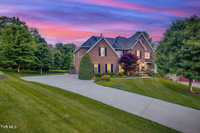 117 Quail Heights Ct, Kingsport, TN 37663 - view of front of house featuring brick siding, a lawn, and driveway