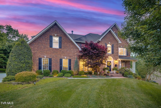 117 Quail Heights Ct, Kingsport, TN 37663 - traditional-style house with brick siding and a yard