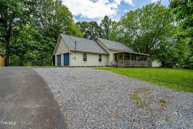 122 Spring Hollow Ln, Jonesborough, TN 37659 - view of front facade with a porch, board and batten siding, a front lawn, a shingled roof, and driveway