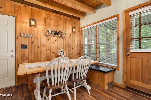 122 Spring Hollow Ln, Jonesborough, TN 37659 - dining space with healthy amount of natural light, wood walls, wood finished floors, and wood ceiling with exposed beams