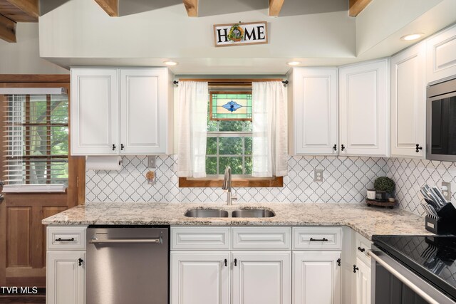 122 Spring Hollow Ln, Jonesborough, TN 37659 - kitchen with stainless steel appliances, a sink, and white cabinetry