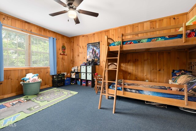 122 Spring Hollow Ln, Jonesborough, TN 37659 - bedroom with wooden walls, carpet flooring, and a ceiling fan