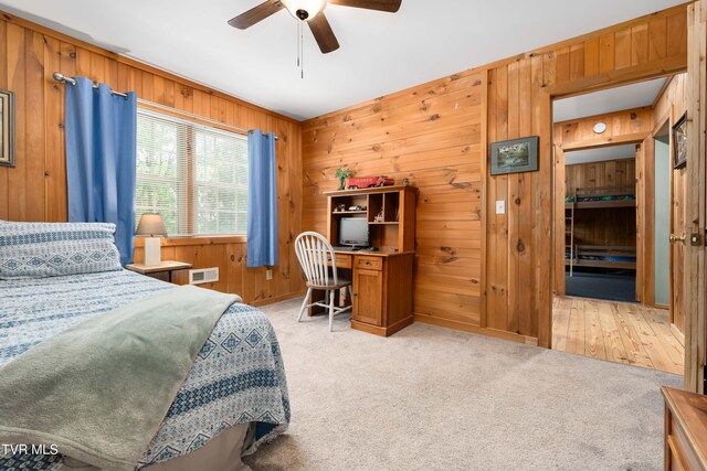 122 Spring Hollow Ln, Jonesborough, TN 37659 - bedroom with wooden walls, light colored carpet, and ceiling fan