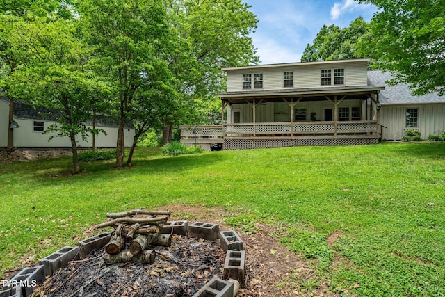 122 Spring Hollow Ln, Jonesborough, TN 37659 - rear view of property with a lawn, a sunroom, and a wooden deck