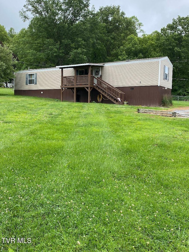 2807 E 6th Ave, Big Stone Gap, VA 24219 - view of front of home with a front lawn, stairs, and a deck