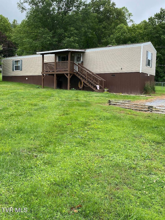 2807 E 6th Ave, Big Stone Gap, VA 24219 - back of house featuring a yard and stairway