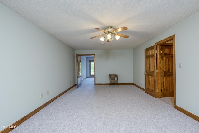 14346 White Top Vw, Abingdon, VA 24210 - empty room with light colored carpet, a ceiling fan, baseboards, and a textured ceiling