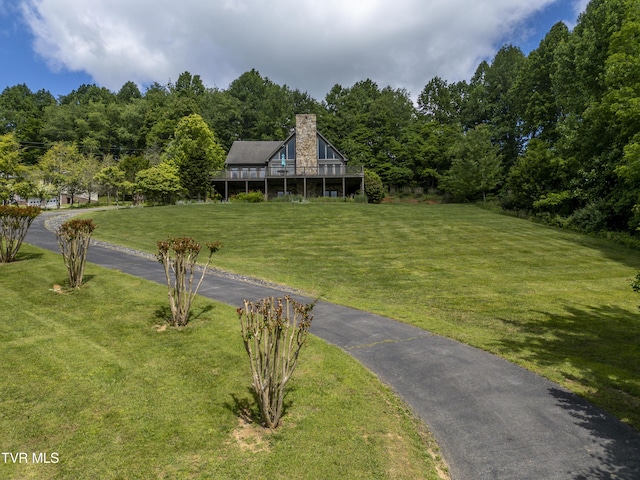 14346 White Top Vw, Abingdon, VA 24210 - view of grassy yard featuring asphalt driveway and a wooded view