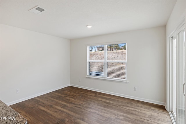 1133 Aspen Ter, Greeneville, TN 37745 - unfurnished room with dark wood-type flooring and baseboards