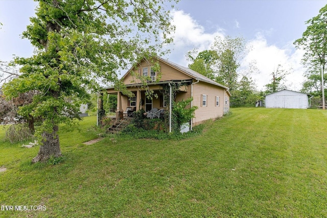 2170 Lone Mountain Rd, Tazewell, TN 37879 - rear view of property featuring a lawn and a porch