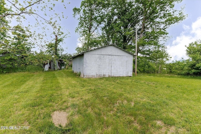 2170 Lone Mountain Rd, Tazewell, TN 37879 - view of green lawn with an outbuilding and an outdoor structure
