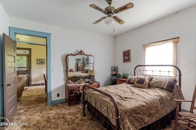 2170 Lone Mountain Rd, Tazewell, TN 37879 - carpeted bedroom with baseboards and ceiling fan