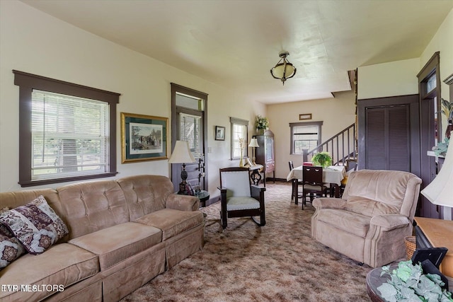 2170 Lone Mountain Rd, Tazewell, TN 37879 - carpeted living room with stairway and healthy amount of natural light