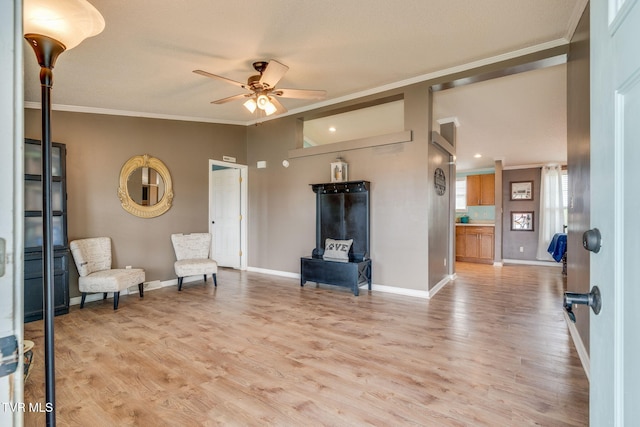 1734 Clear Springs Rd, Limestone, TN 37681 - living area with ceiling fan, crown molding, light wood-type flooring, baseboards, and vaulted ceiling