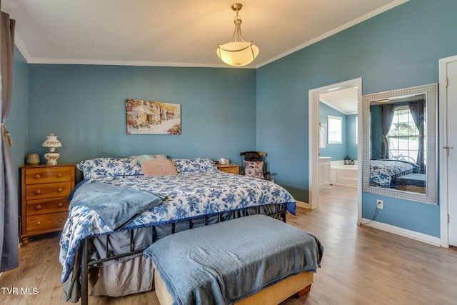 1734 Clear Springs Rd, Limestone, TN 37681 - bedroom featuring wood finished floors, ornamental molding, baseboards, and connected bathroom