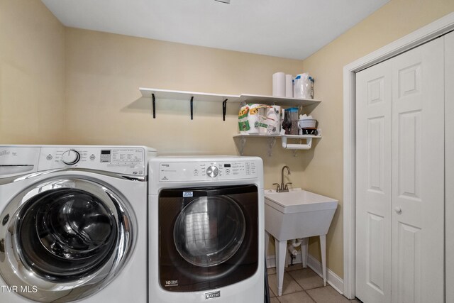 2361 Old Stage Rd, Afton, TN 37616 - washroom featuring washer and dryer and light tile patterned floors