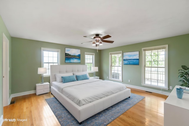 2361 Old Stage Rd, Afton, TN 37616 - bedroom featuring baseboards, light wood-style floors, and a ceiling fan