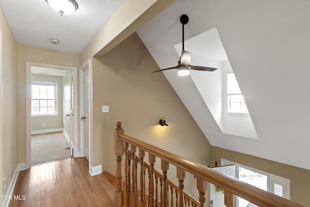 2361 Old Stage Rd, Afton, TN 37616 - hall with light wood-type flooring, an upstairs landing, baseboards, and a skylight