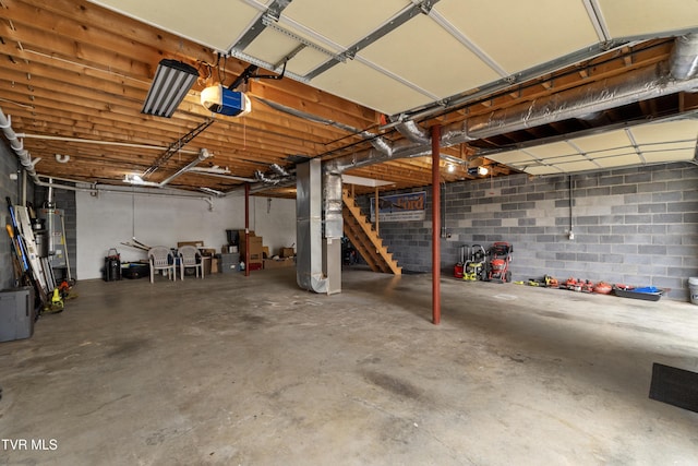 2361 Old Stage Rd, Afton, TN 37616 - unfinished basement with stairway and concrete block wall