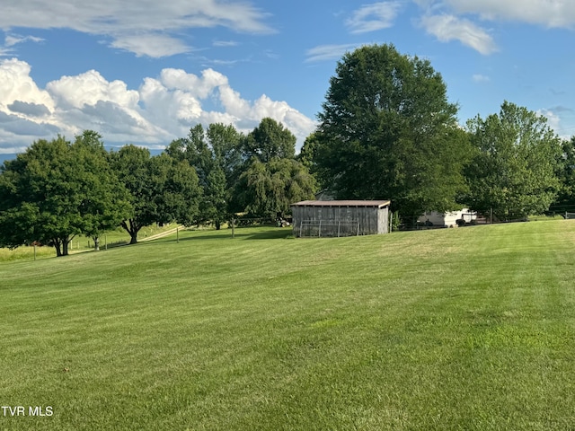 2361 Old Stage Rd, Afton, TN 37616 - view of green lawn featuring view of wooded area and an outdoor structure