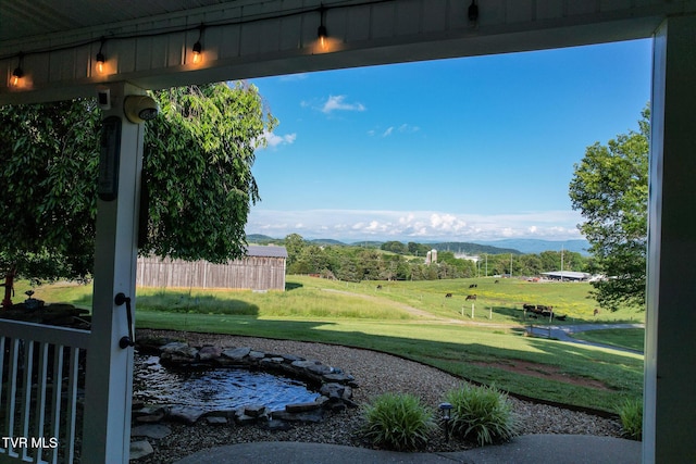 2361 Old Stage Rd, Afton, TN 37616 - view of grassy yard with a mountain view and a garden pond