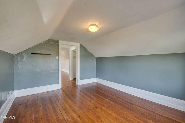 905 Kentucky Ave, Bristol, TN 37620 - additional living space with hardwood / wood-style floors and vaulted ceiling