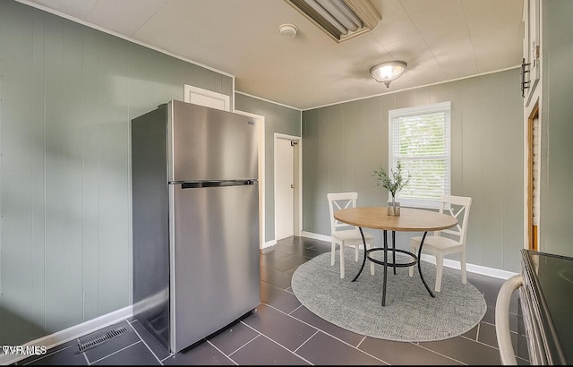 905 Kentucky Ave, Bristol, TN 37620 - dining room with crown molding and dark tile patterned floors