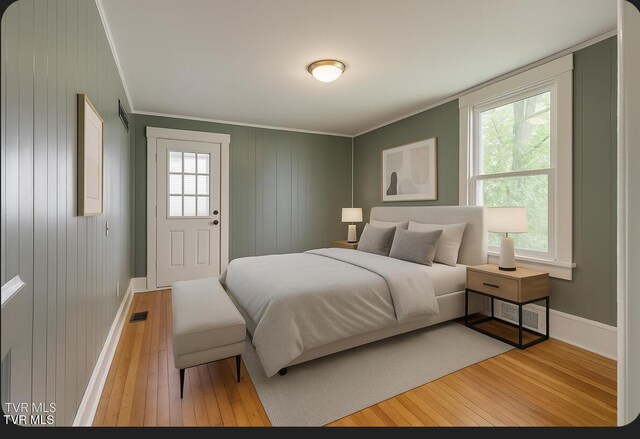 905 Kentucky Ave, Bristol, TN 37620 - bedroom with crown molding, hardwood / wood-style floors, and multiple windows
