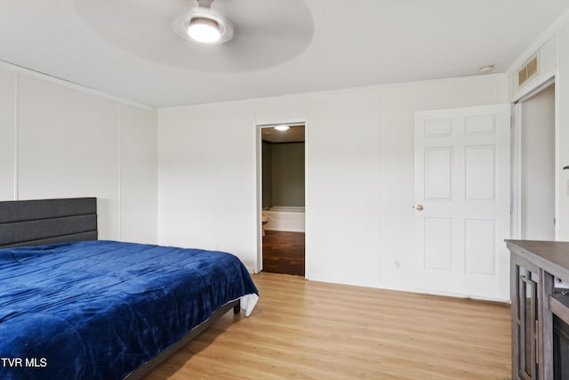 364 Berry Ridge Rd, Jonesborough, TN 37659 - bedroom with ornamental molding, light wood finished floors, ensuite bath, and ceiling fan